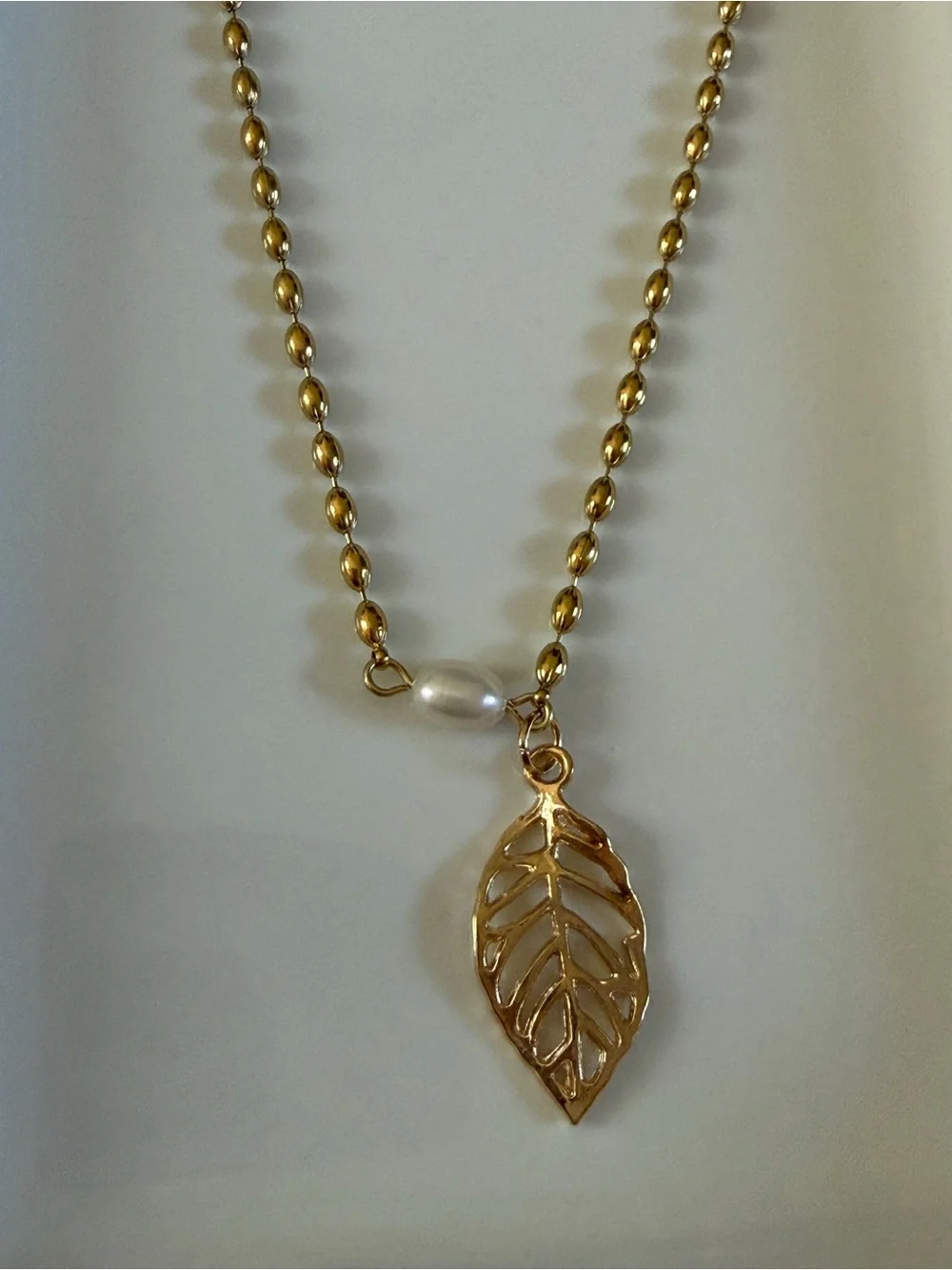Gold Leaf Pendant Necklace with Pearl Accent
